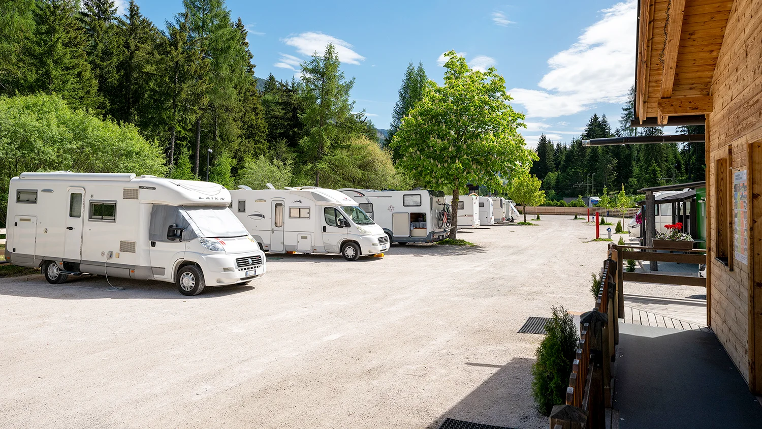 The pitches at Camperpark Dolomites provide ample space for motorhomes, camper vans, and caravans of various sizes
